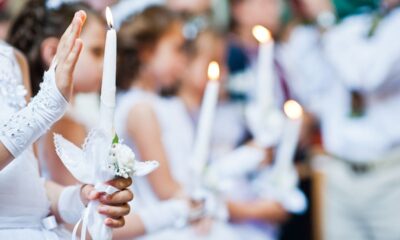 mani candele bambine sacramento